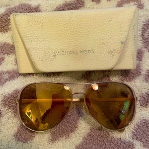 Michael Kors rose gold driving sun glasses. Non Prescription